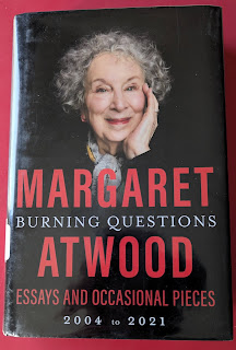 A hardback of Burning Questions by Margaret Atwood, essays 2004 to 2021